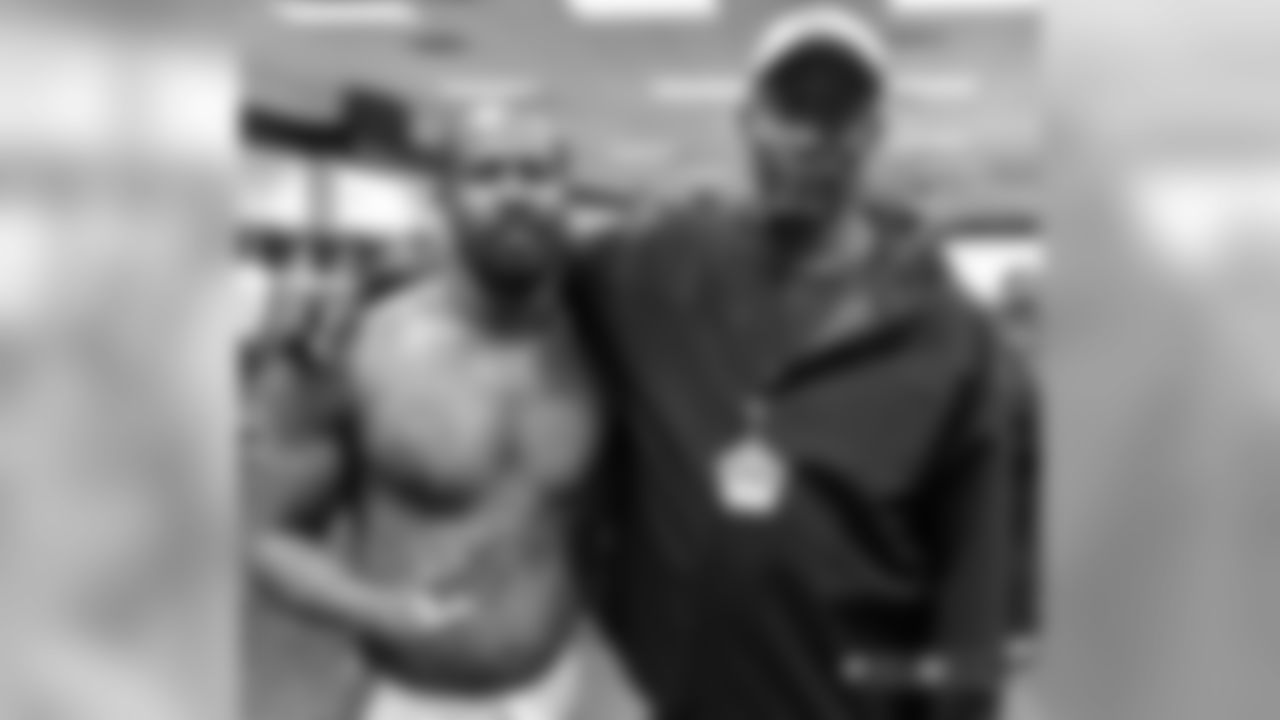 Von Miller poses for a photos with Ring of Fame former defensive end and linebacker Simon Fletcher after Saturday's game against the Browns. Miller passed Fletcher to become the Broncos' all-time leader in sacks.