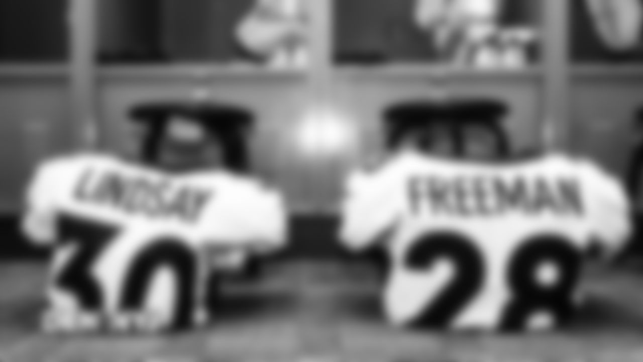 Phillip Lindsay's and Royce Freeman's jerseys in the locker room pregame before the Broncos' Week 5 game against the New York Jets at MetLife Stadium on October 7, 2018.