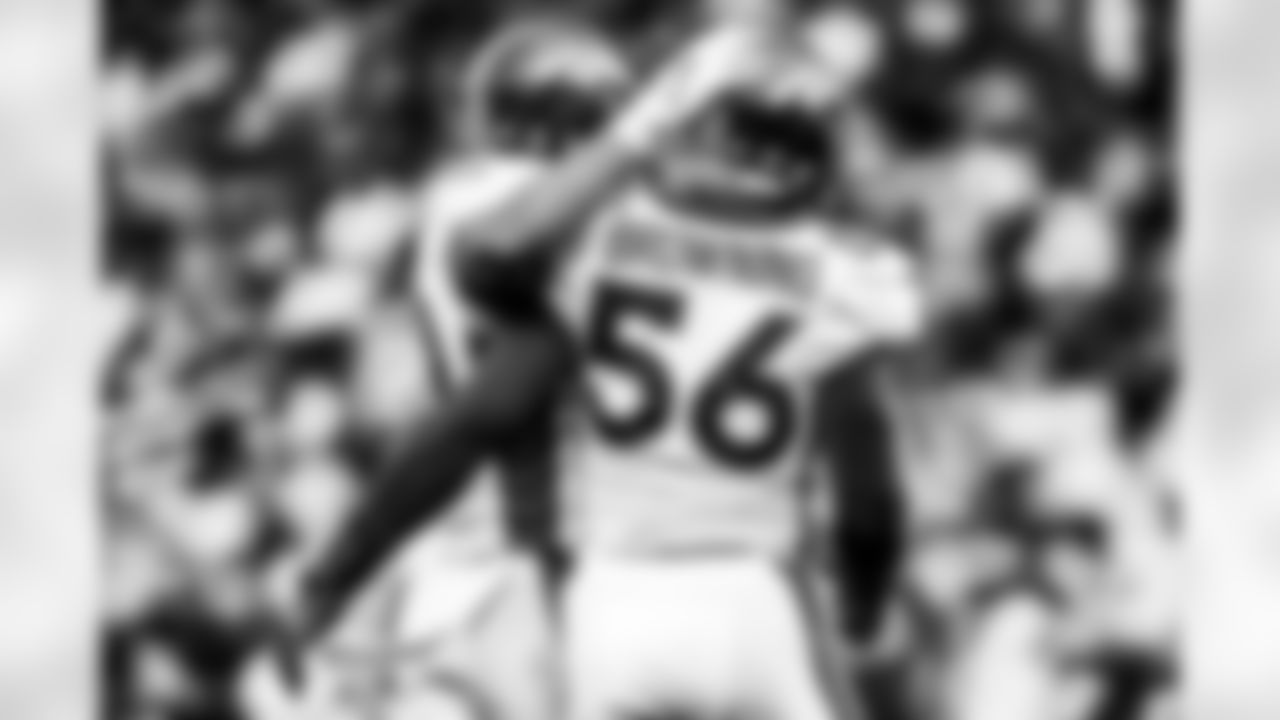 Jonas Griffith and Baron Browning during the Broncos' Week 16 game against the Las Vegas Raiders at Allegiant Stadium in Las Vegas, Nevada on December 26, 2021. (Photo by David Dermer)