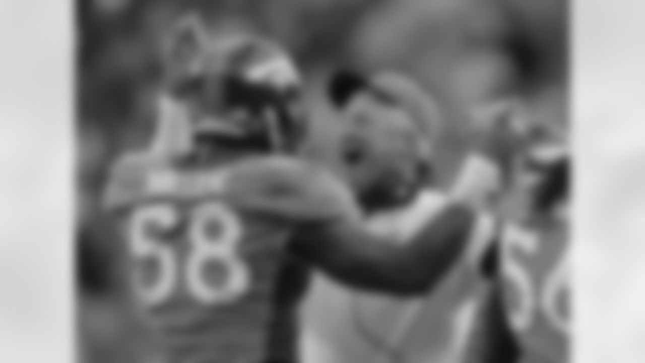 Miller and Fox celebrate the pick-six.
