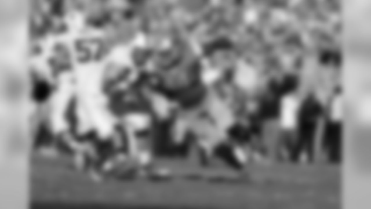 UCLA's Owamagbe Odighizuwa tries to get around the edge of Stanford's offensive line.