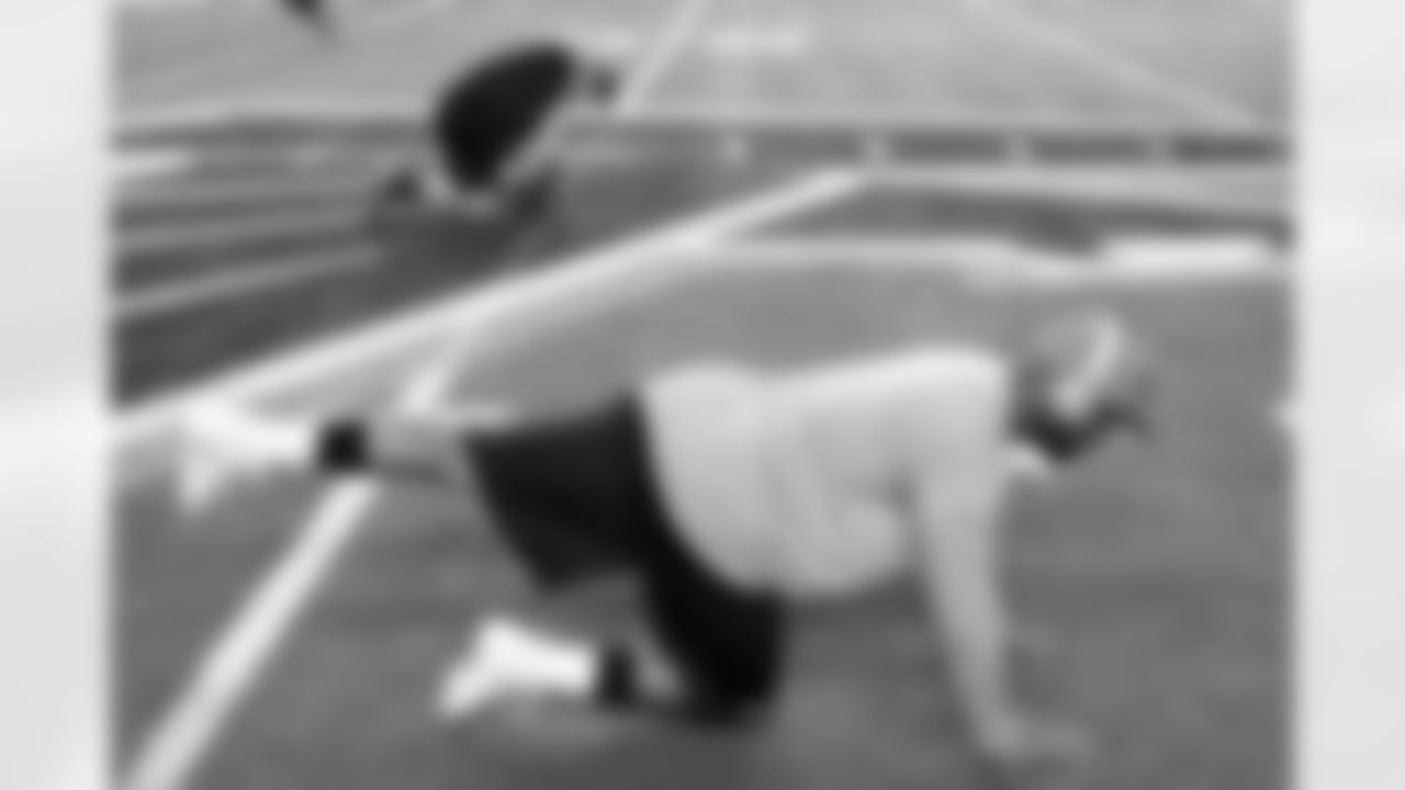 DT Kevin Vickerson limbers up before the Broncos-Falcons Monday night showdown.