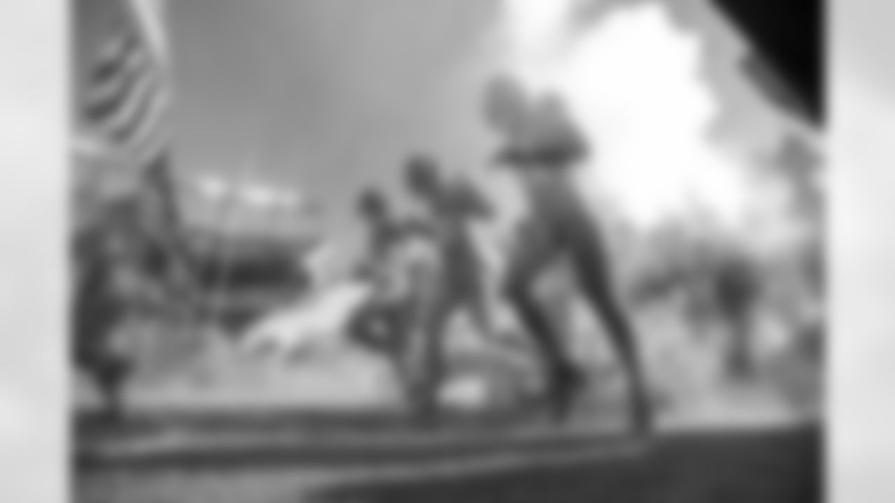 Pat Surtain II, Kareem Jackson, Justin Simmons Troops run out of the tunnel with players during a NFL game against the Las Vegas Raiders on Sunday, November 20, 2022 at Empower Field at Mile High in Denver, Colorado.
Photo by Gabriel Christus / Denver Broncos