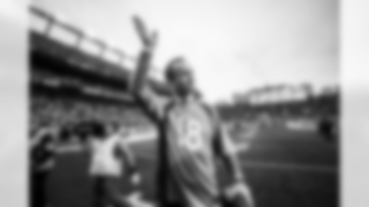 Peyton Manning waves to the crowd during the halftime Ring Of Fame ceremony during the NFL game against the Washington Football Team on Sunday, October 31, 2021 at Empower Field at Mile High in Denver, Colorado.
Photo by Gabriel Christus