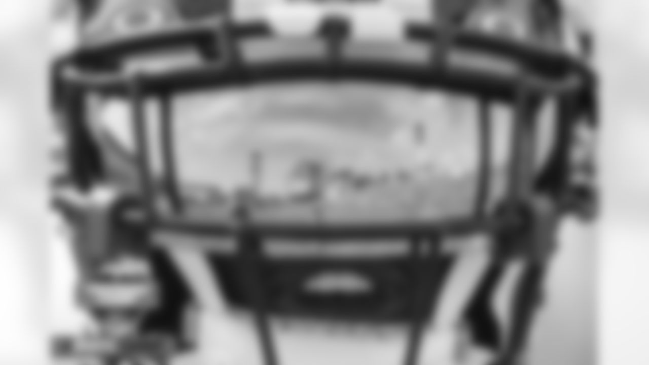 A view of the fans reflected in Melvin Gordon III's visor at practice on Day 3 of training camp at UCHealth Training Center in Englewood, Colorado on July 29, 2022. (Photo by Ben Swanson)