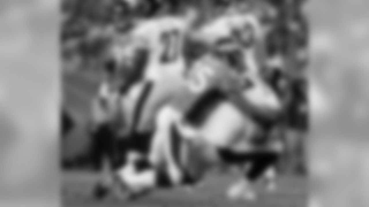 Chris Harris Jr. sacks Pittsburgh Steelers QB Ben Roethlisberger in third-quarter action against the Pittsburgh Steelers.