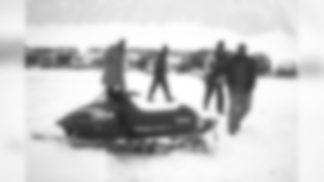 Denver: Members of the team arrived at the PDB Facility any way they could, via sport utility or snowmobile because of devastating blizzard conditions against the Buffalo Bills at Rich Stadium in Orchard Park, NY on October 26, 1997.