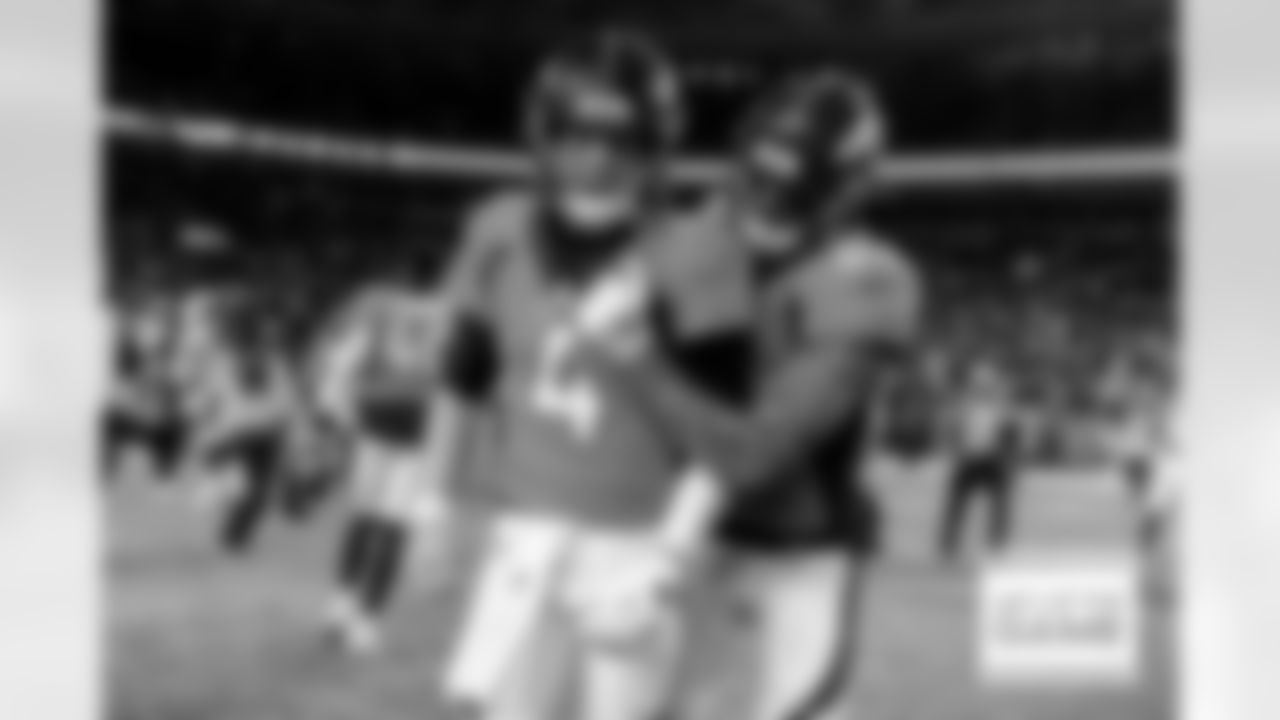 Denver Broncos tight end Eric Saubert (82) embraces quarterback Brett Rypien (4) after the end of regulation during a NFL game against the Arizona Cardinals on Sunday, December 18, 2022 at Empower Field at Mile High in Denver, Colorado.
Photo by Gabriel Christus/Denver Broncos