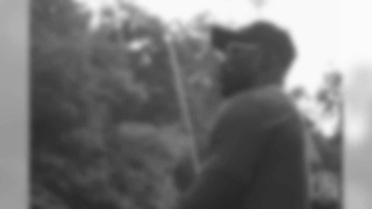 Von Miller tries his hand at fly fishing at the fishing portion of Von Miller's Pass Rush Summit at Dogwood Canyon Nature Park on June 28, 2018.