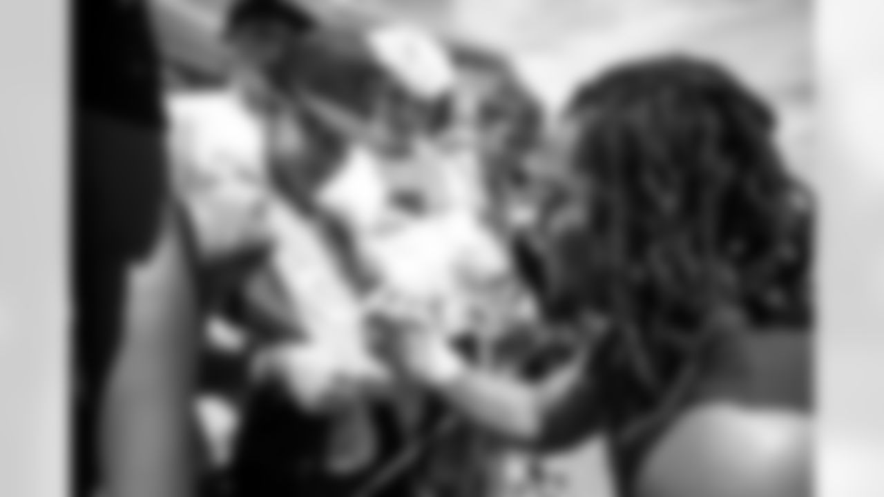 Nik Bonitto signs autographs for fans during a training camp practice at Centura Health Training Center on August 1, 2023 in Englewood, Colorado. Photo by Ben Swanson / Denver Broncos