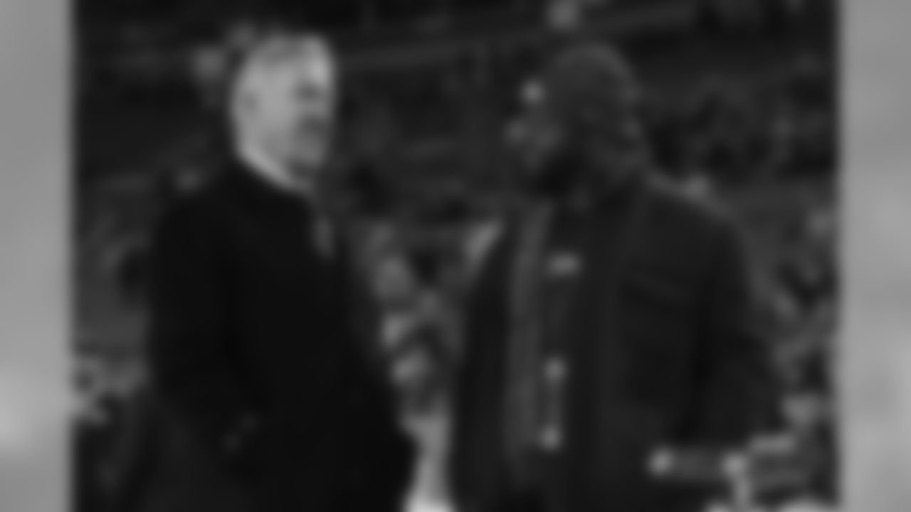 President of Football Operations/General Manager John Elway talks with Al Wilson before the Broncos' Week 15 game against the Cleveland Browns at Broncos Stadium at Mile High on December 15, 2018.