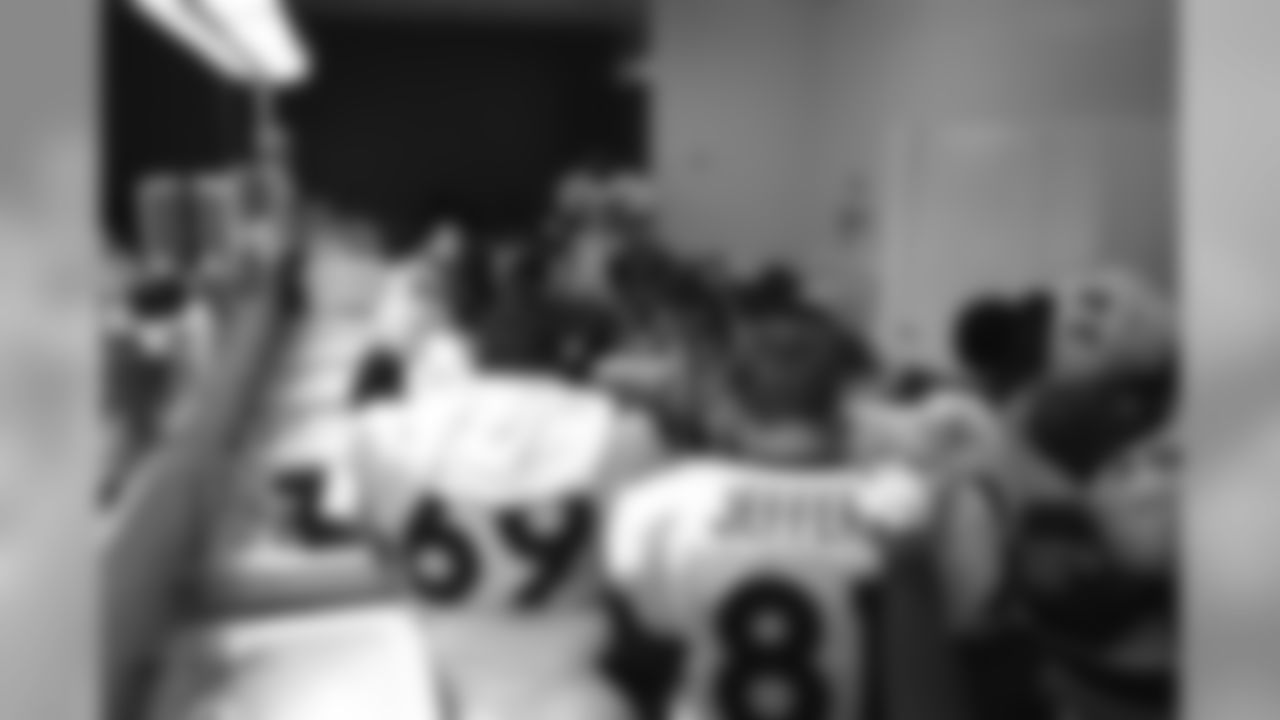 Patrick Jeffers and his teammates have a pre-game prayer before their game against the Chiefs against the Kansas City Chiefs at Arrowhead Stadium in Kansas City on January 4, 1998.