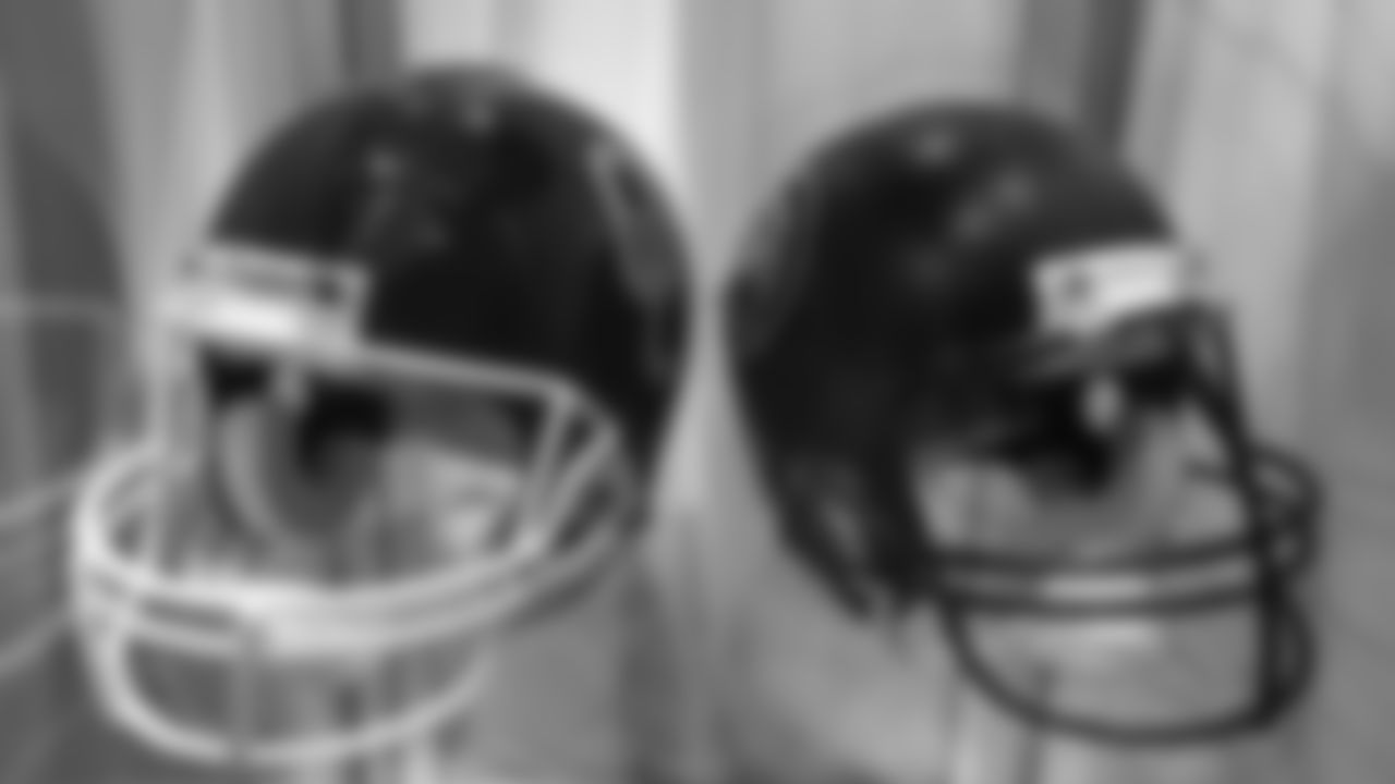 Helmets for the Oklahoma Sooners and the Edmonton Huskies is featured in a display at the open-house tribute to Pat Bowlen at Broncos Stadium at Mile High on June 18, 2019. Bowlen attended school at Oklahoma and competed on their freshman football team and played for the Huskies in the Canadian Junior Football League.