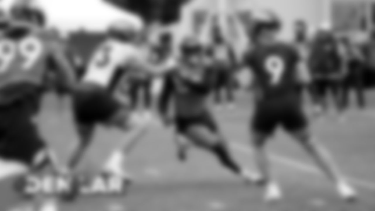 Von Miller tries to get to Kevin Hogan during practice on August 21, 2019 at UCHealth Training Center.