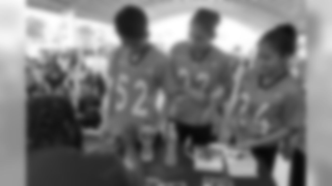 Zach Kerr signs autographs during a visit to the Tochito National Tournament on February 9, 2019, as a player ambassador for the flag football tournament.
