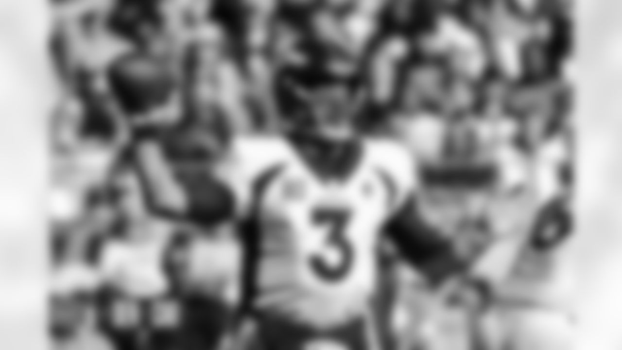 Russell Wilson during the Broncos' Week 12 game against the Carolina Panthers at Bank of America Stadium in Charlotte, North Carolina on November 27, 2022. (Photo by Clark Washington)