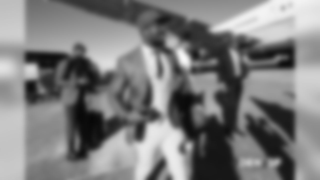 Von Miller walks on the tarmac during the team's travel to San Francisco on December 8, 2018 for their Week 14 game against the 49ers.