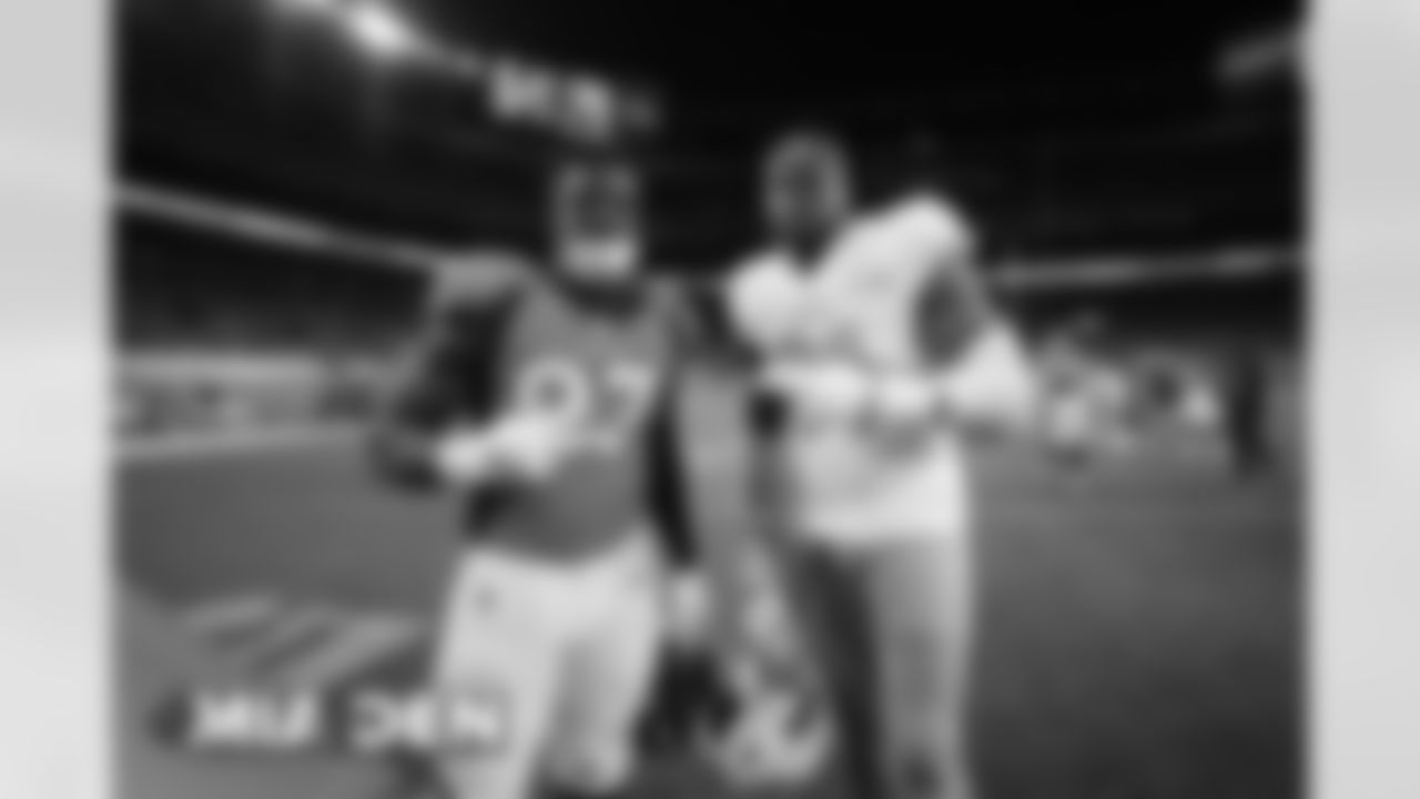 Jeremiah Attaochu and Emmanuel Ogbah after the Broncos' Week 11 game against the Miami Dolphins at Empower Field at Mile High in Denver, Colorado on November 22, 2020. (Photo by Gabriel Christus)
