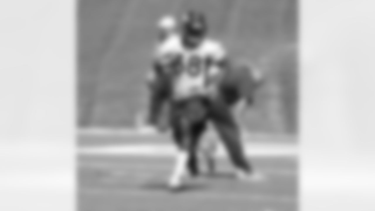 Second-round pick Montee Ball carries the ball.
