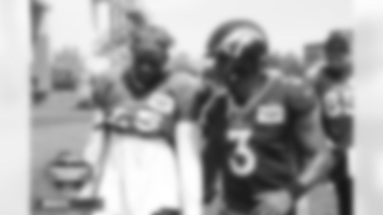 Melvin Gordon III and Russell Wilson during training camp on Monday, August 1, 2022 at UCHealth Training Center in Englewood, Englewood.
Photo by Gabriel Christus/Denver Broncos