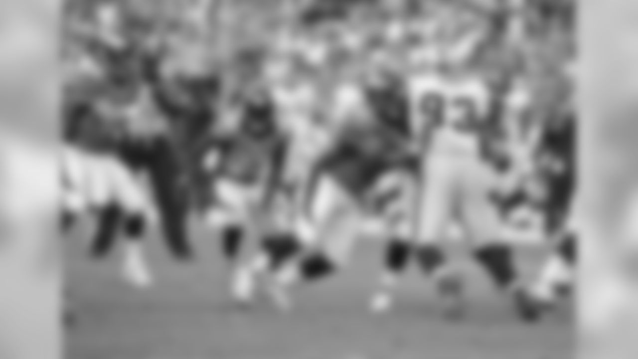 Manning takes a snap in the second half.
