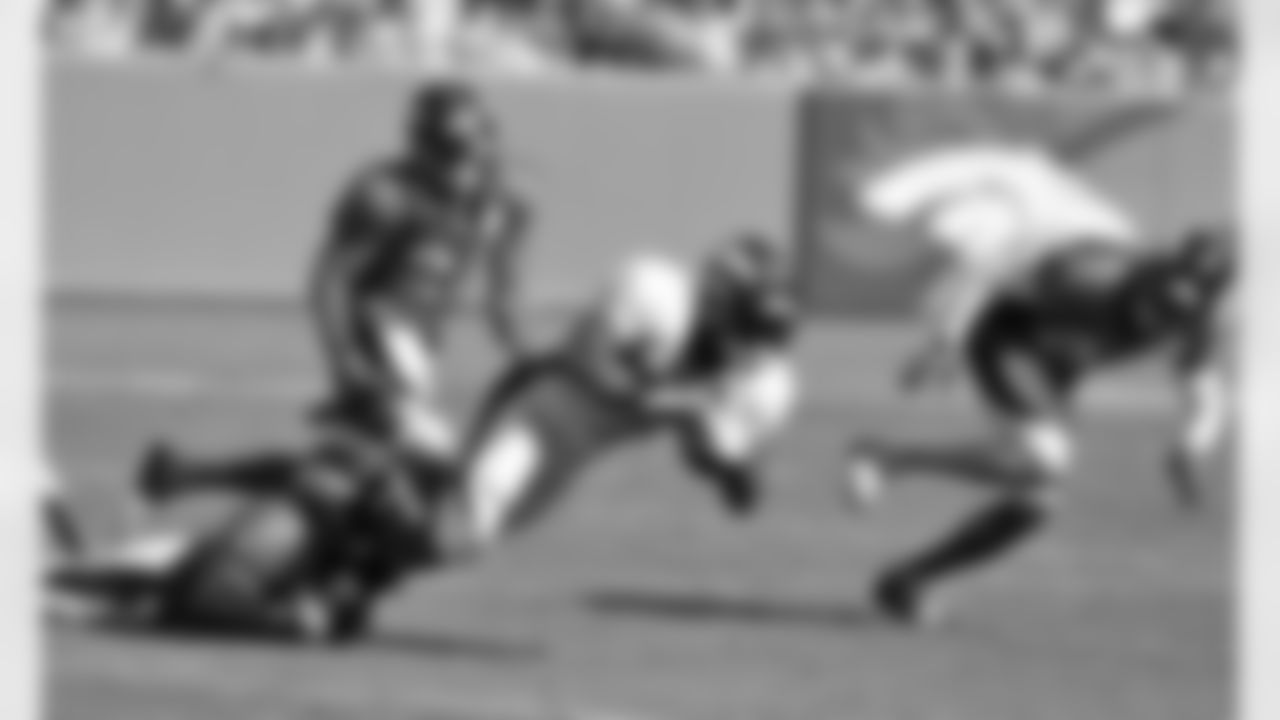RB Jeremiah Johnson runs the ball during Saturday's Summer Scrimmage.