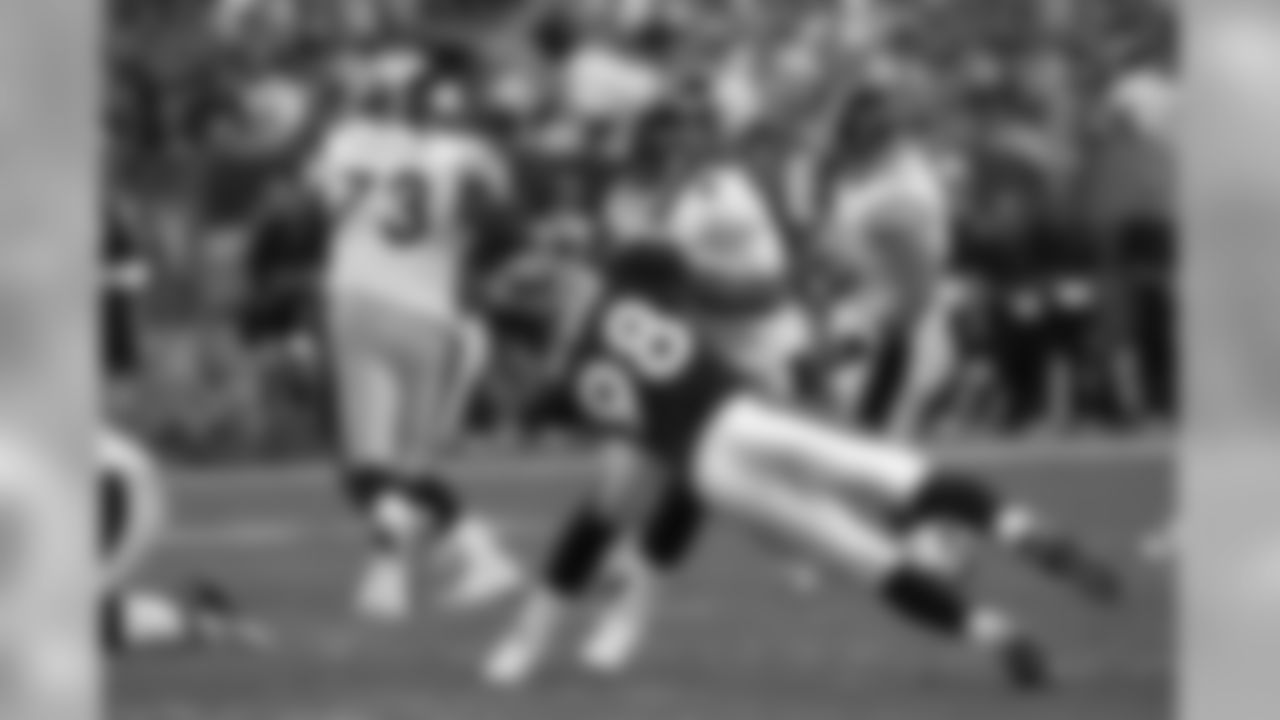 Reggie Hayward (2001 NFL Draft - third round, 87th overall) sacks Steelers quarterback Tommy Maddox in 2003. Hayward played four years with the Broncos, totaling 22 sacks as a Bronco and starting 19 of 47 games.