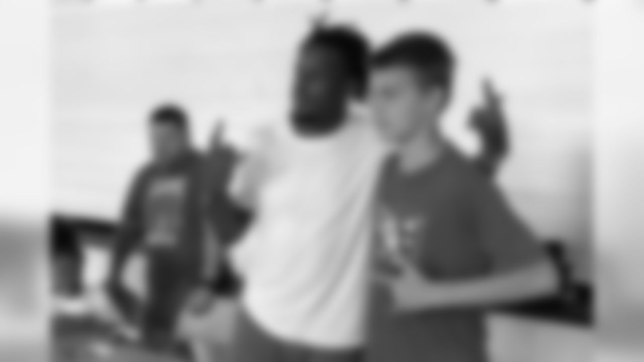 Shamarko Thomas interacts with children at his youth football camp in Virginia Beach on June 8, 2019.