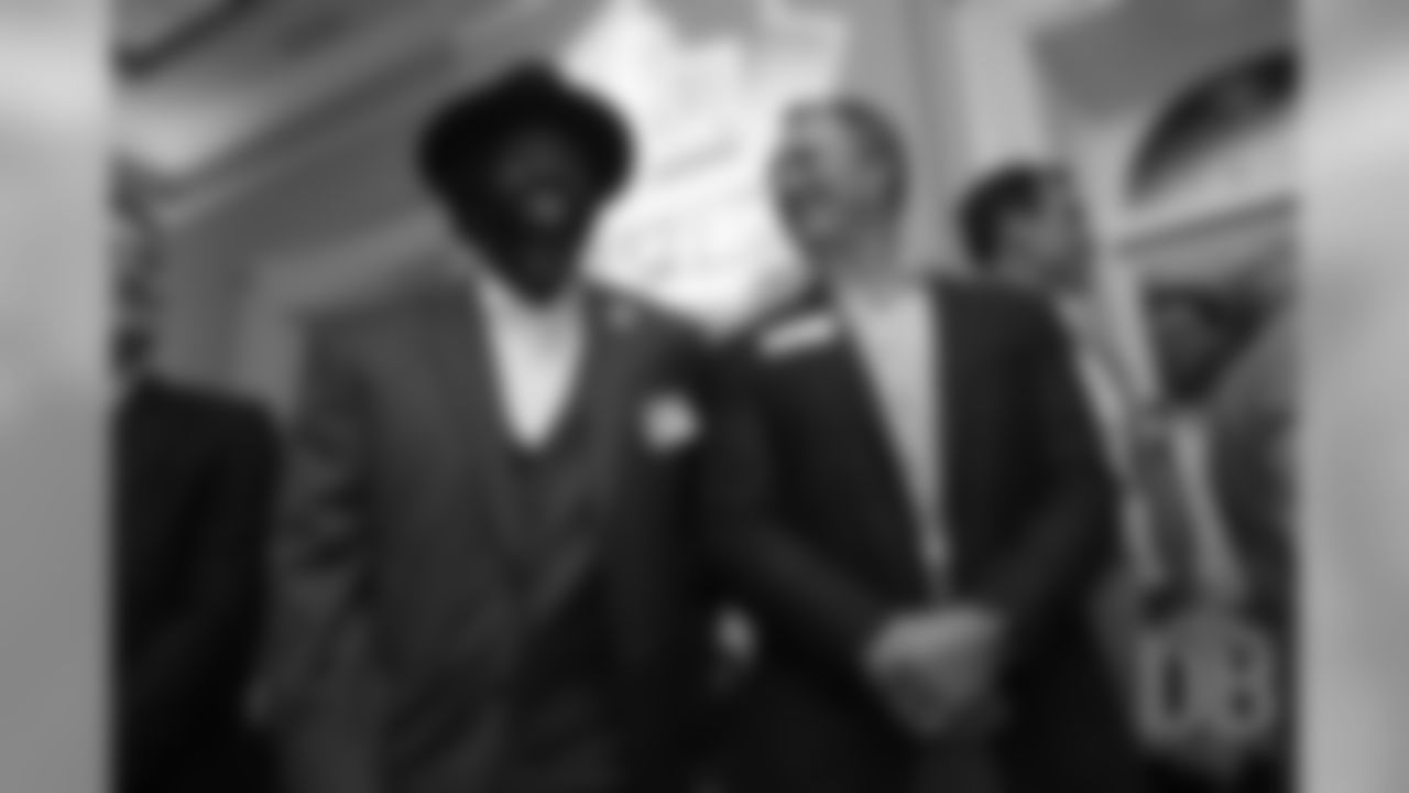 Ed Reed talks with John Lynch at the Pro Football Hall of Fame's Celebration of Excellence Reception in Atlanta on January 31, 2019.
