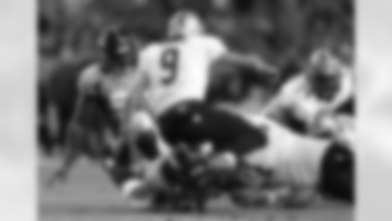 LB Wesley Woodyard forces a fumble while recording a first-sack of Saints QB Drew Brees.