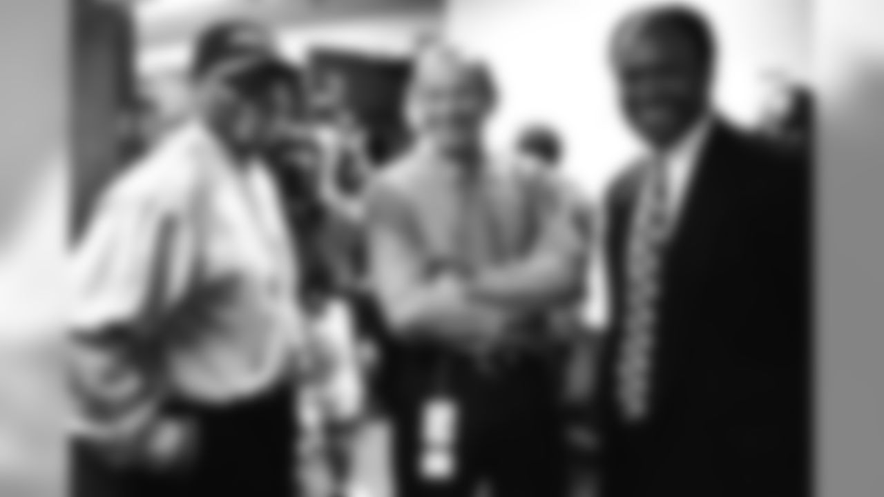 Floyd Little, Pat Bowlen and Billy Thompson met in the locker room following the Broncos victory over the Seahawks against the Seattle Seahawks at Kingdome in Seattle, WA on October 11, 1998.