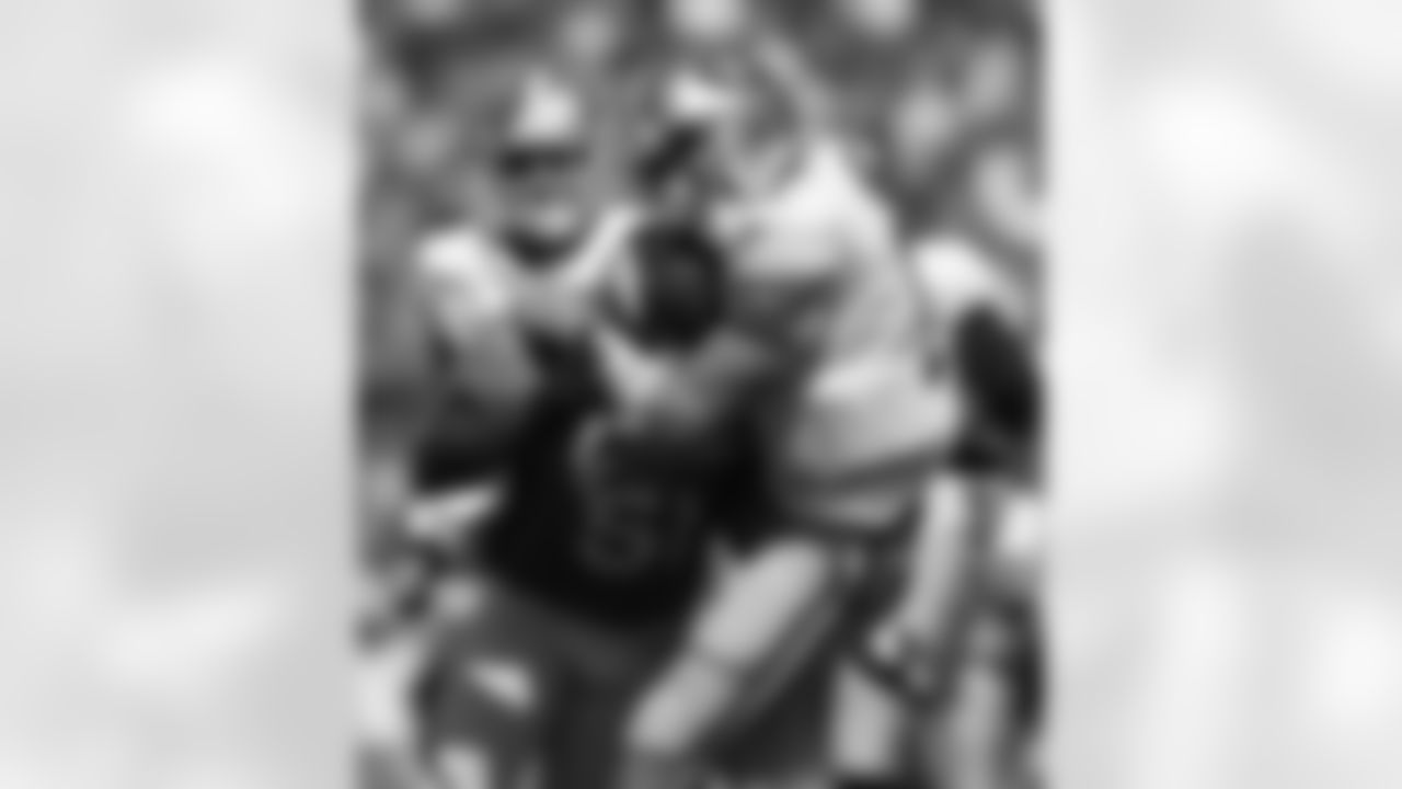 Linebacker Joe Mays hits San Francisco quarterback Alex Smith.