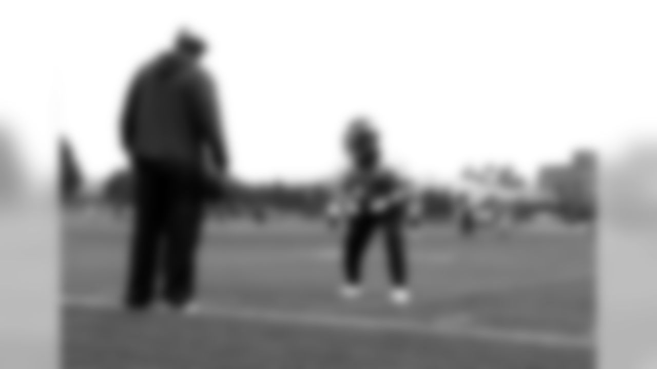 CB Coryell Judie gets ready to begin a backpeddling drill as assistant secondary coach Sam Garnes watches.