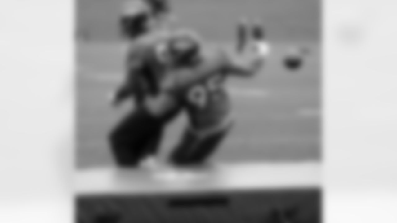 Quanterus Smith and Derek Wolfe