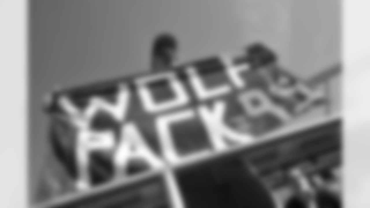 A fan shows his support for rookie defensive end Derek Wolfe.