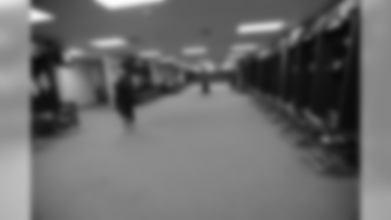A look inside the Broncos' locker room at Gillette Stadium.
