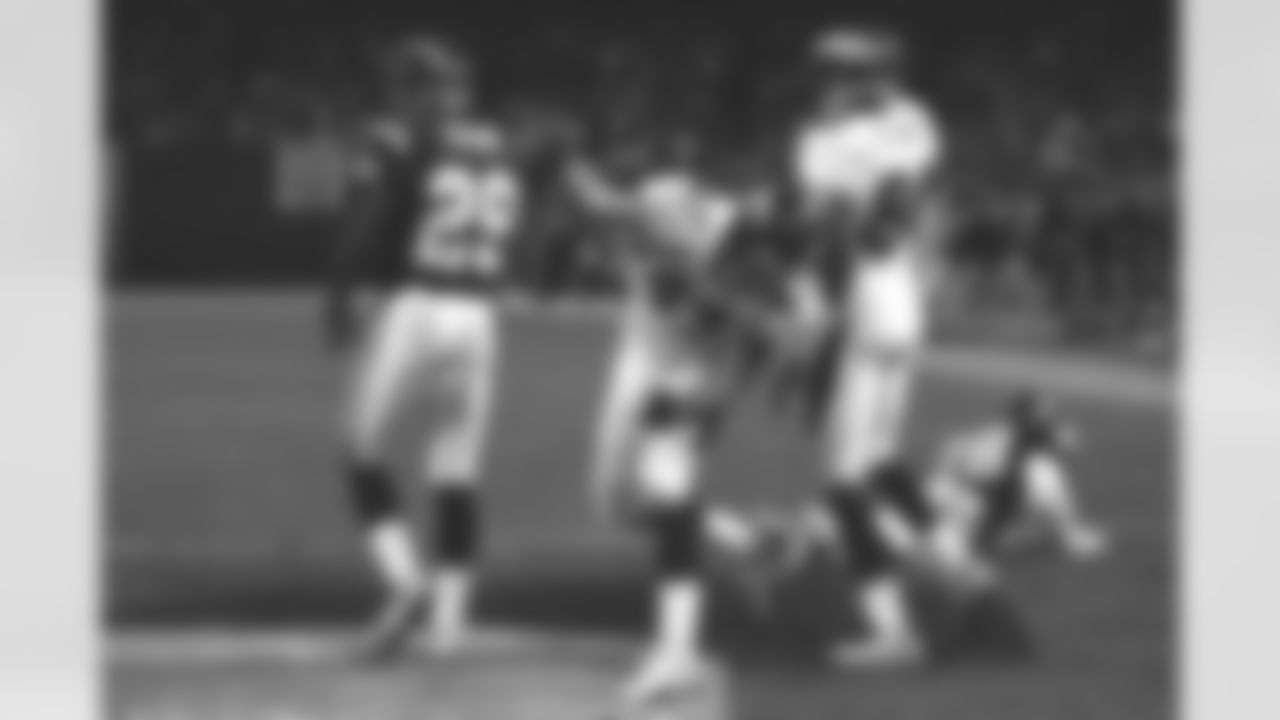 San Diego: Ed McCaffrey spikes the ball in the end zone after making a touchdown reception against the San Diego Chargers at Jack Murphy Stadium in San Diego, CA on November 30, 1997.