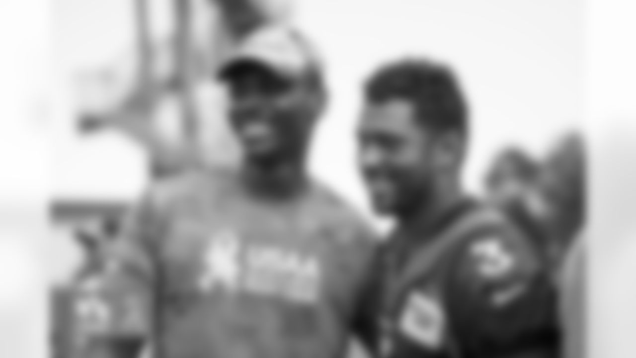 Russell Wilson during a USAA Salute to Service meet-and-greet session after practice at UCHealth Training Center in Englewood, Colorado on August 25, 2022. (Photo by Ben Swanson)