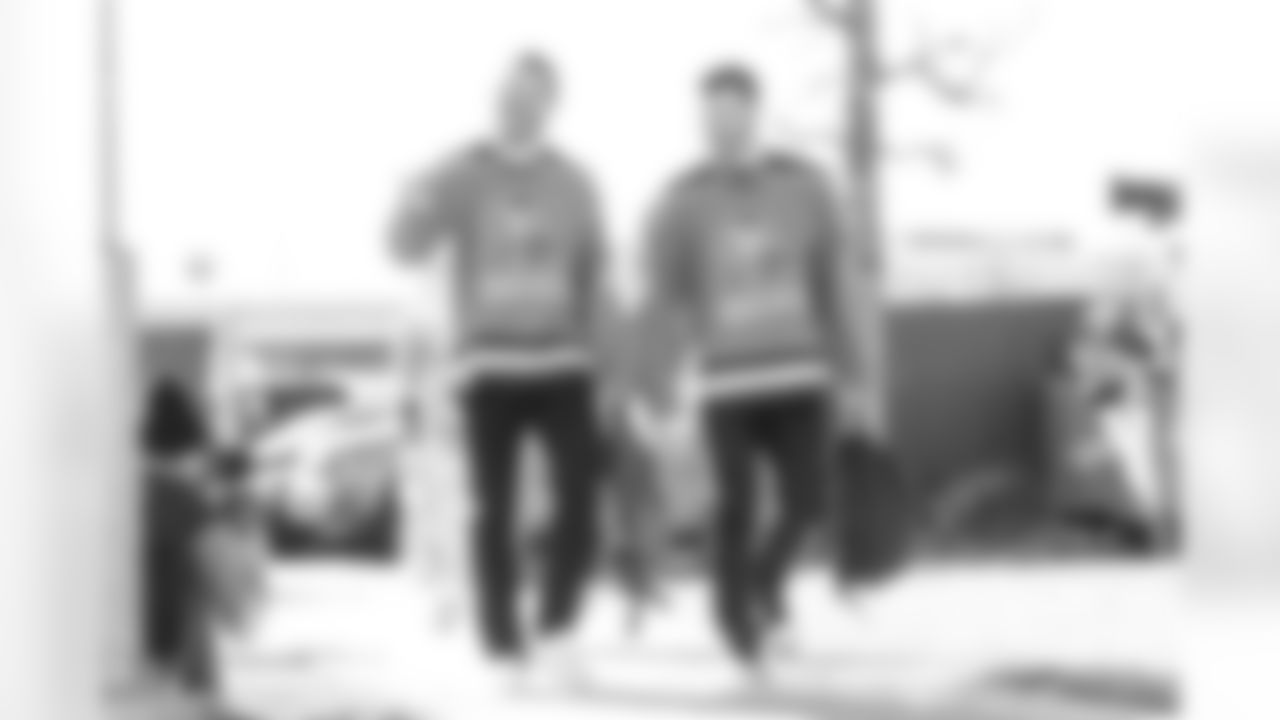 Alex Singleton and Josey Jewell in Mighty Ducks jerseys during team arrivals before the Broncos' Week 14 game against the Kansas City Chiefs at Empower Field at Mile High in Denver, Colorado on December 11, 2022. (Photo by Ben Swanson)