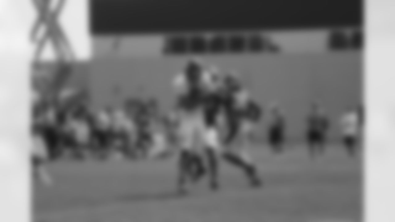 Decker takes a hit after the catch.