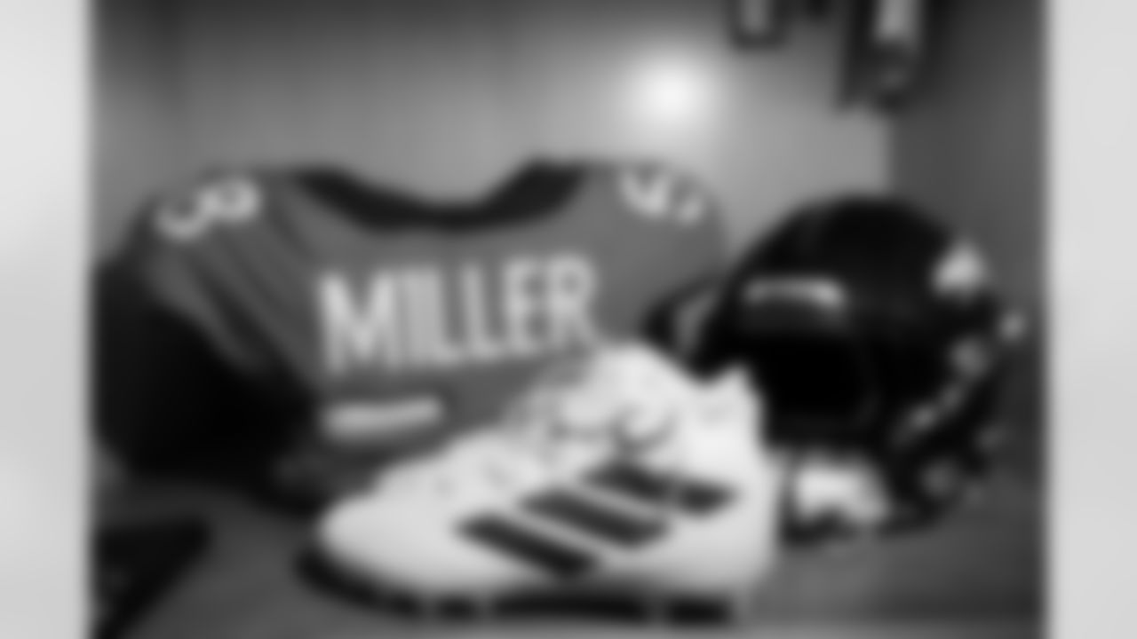 Von Miller's jersey, cleats and helmet in the locker room before the Broncos' Week 4 game against the Baltimore Ravens on October 3, 2021 at Empower Field at Mile High in Denver, Colorado. (Photo by Ben Swanson)