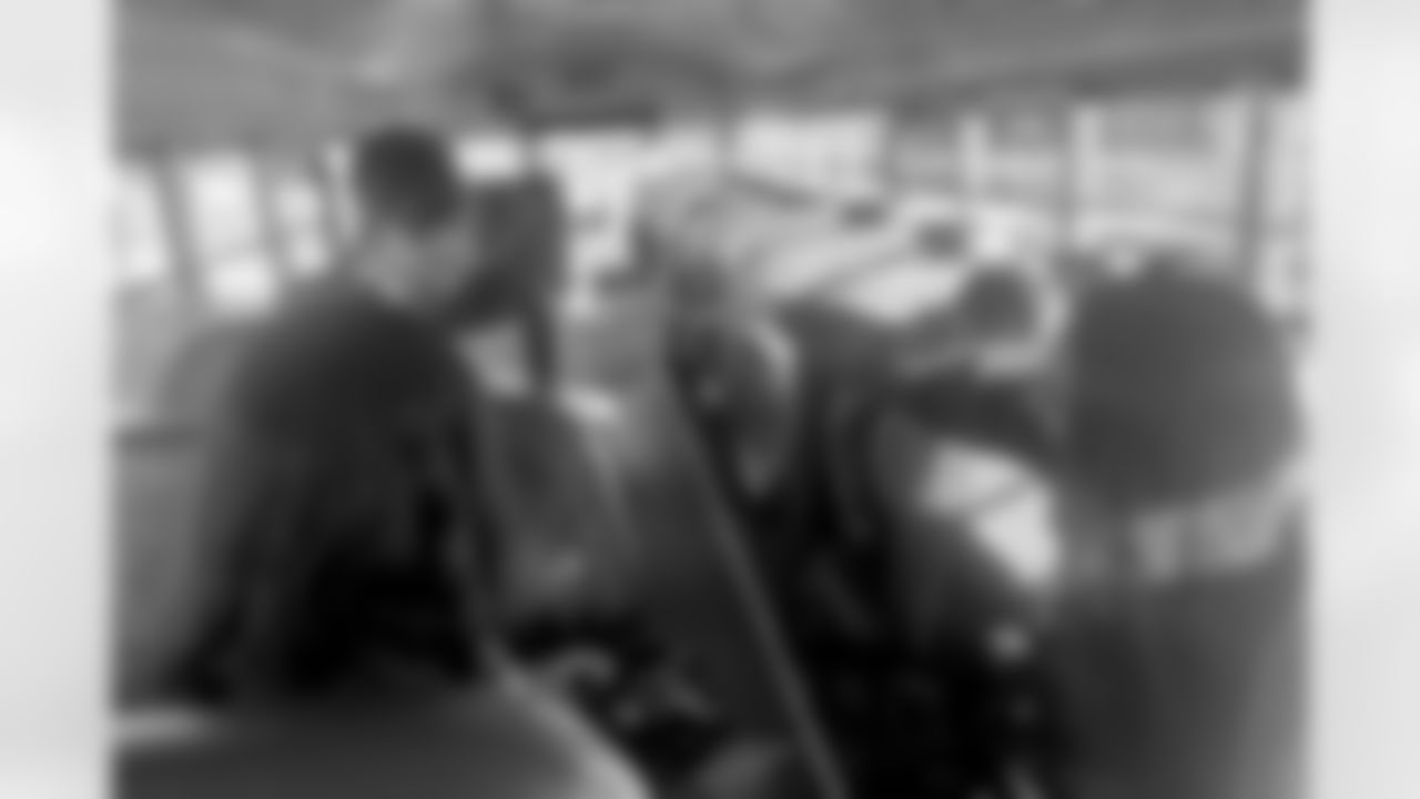 Denver Broncos Cheerleaders ride the school bus with children during an event as part of Random Acts of Kindness Week at in Denver, Colorado on February 14, 2023. Photo credit: Denver Broncos