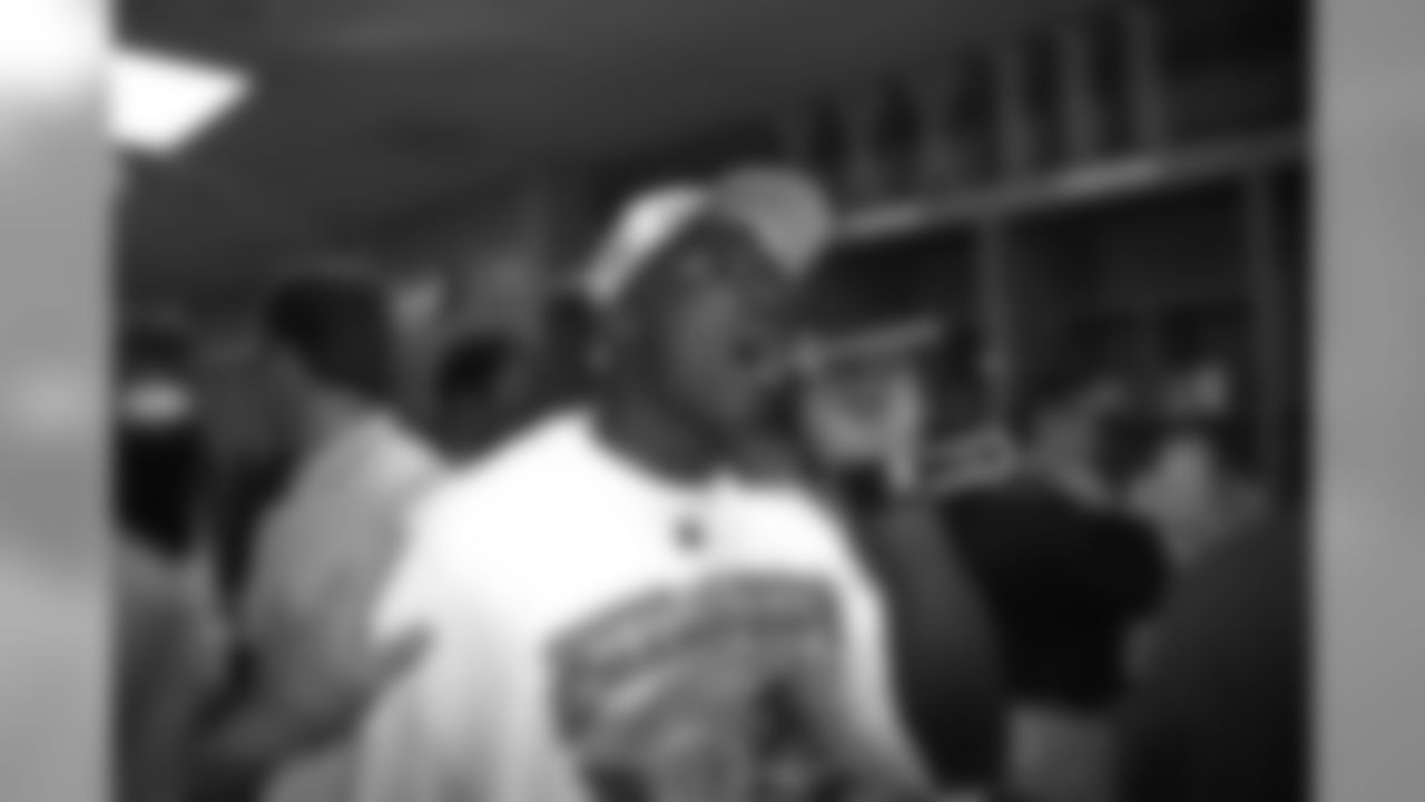 Terrell Davis celebrates another Broncos Super Bowl victory in the locker room at Pro Player Stadium in Miami, FL on January 31, 1999.