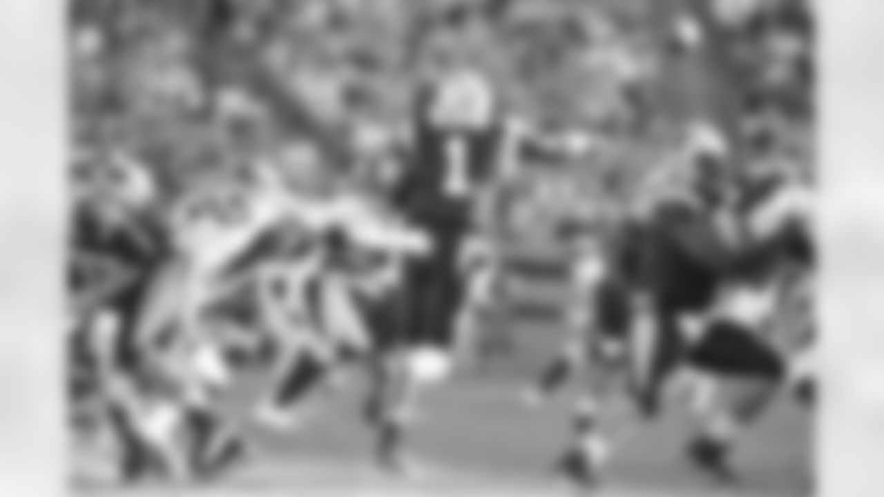 Newton gets rid of the ball just in time.