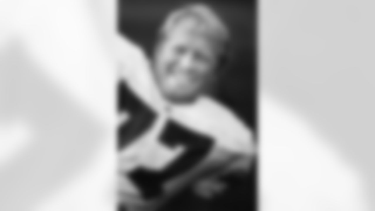 A headshot of linebacker Karl Mecklenburg