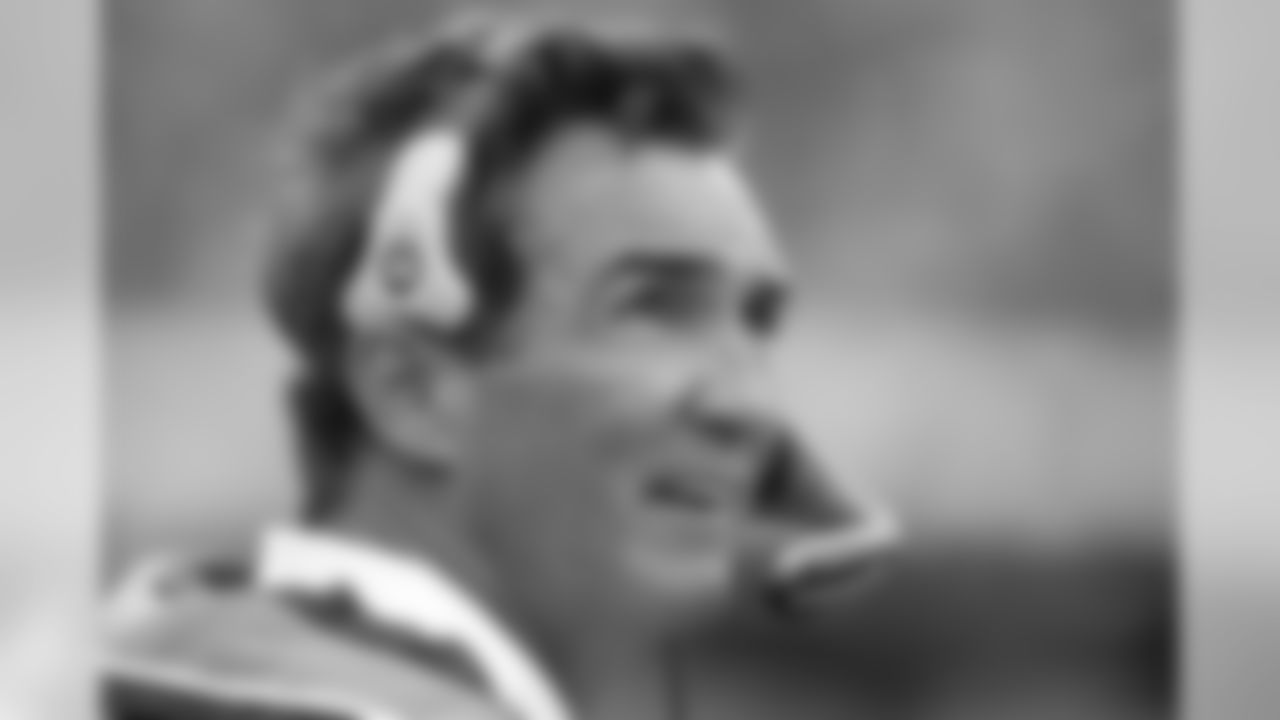 Mike Shanahan watches the game action from the sidelines during the NFL game against the Oakland Raiders on October 17, 2004 at Network Associates Coliseum in Oakland, California.