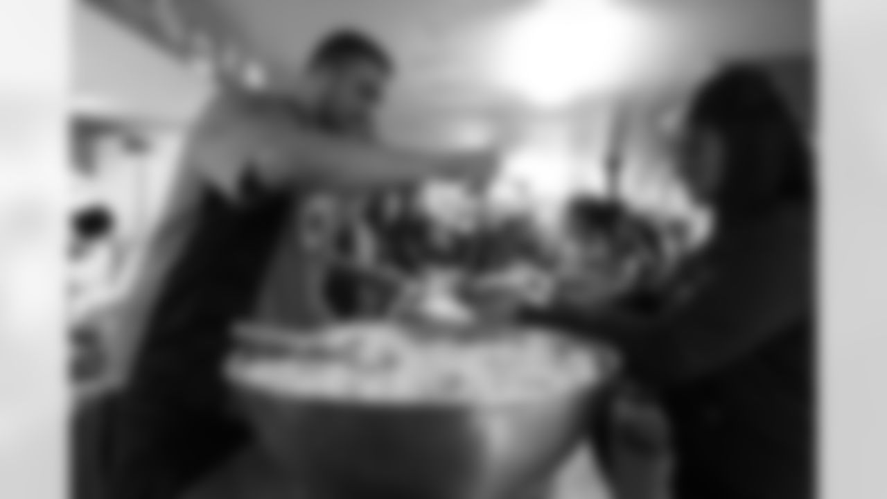 Ben Garland serves food at La Puente Home shelter in Alamosa as part of the Broncos' 2015 Mile High Salute to Fans Tour. For more information on the shelter and how you can donate, please visit the shelter's website.