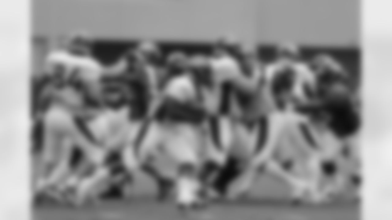 Ball looks for room to run.
