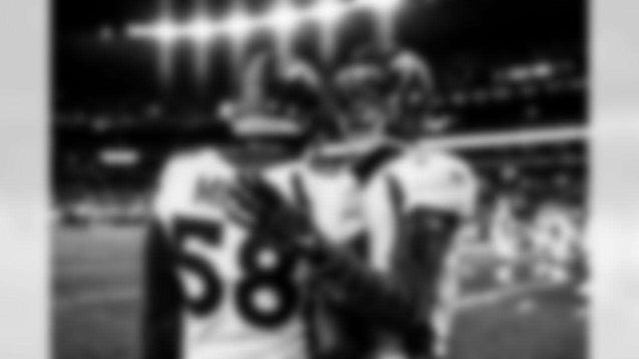 Von Miller and Teddy Bridgewater before the Broncos' Week 7 game against the Cleveland Browns at FirstEnergy Stadium in Cleveland, Ohio on October 21, 2021. (Photo by Gabriel Christus)