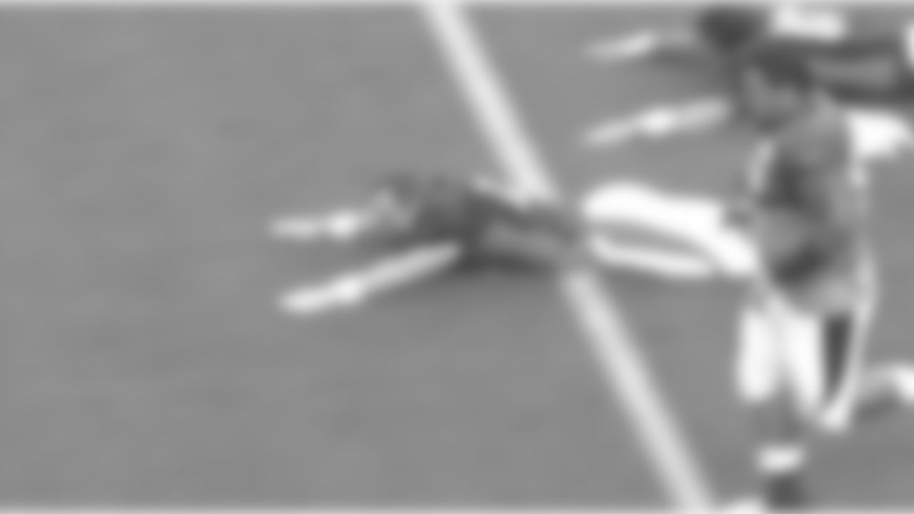 Peyton Manning and teammates turned the field into a Slip-N-Slide.